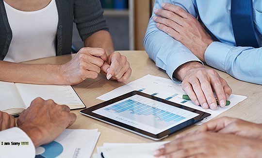 A professional reviewing financial information